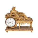 AN AUSTRIAN LATE BIEDERMEIER CARVED GILTWOOD FIGURAL MANTEL CLOCK