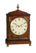 A GEORGE IV BRASS MOUNTED MAHOGANY BRACKET CLOCK