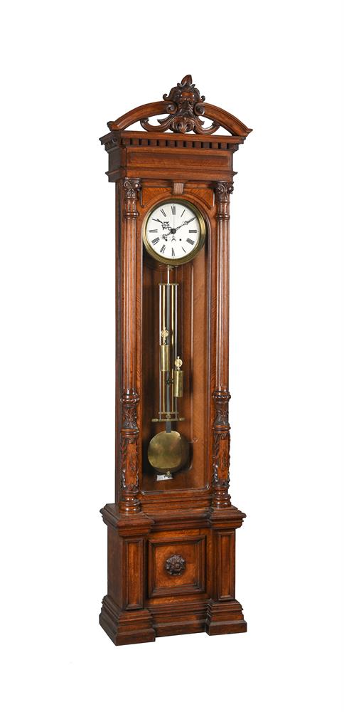 AN IMPRESSIVE GERMAN CARVED OAK HOUR-STRIKING LONGCASE REGULATOR WITH CENTRE-SECONDS