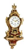 A FINE FRENCH LOUIS XV ORMOLU MOUNTED TORTOISHELL QUARTER-STRIKING BRACKET CLOCK WITH WALL BRACKET