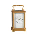 A FRENCH GILT BRASS REPEATING CARRIAGE CLOCK