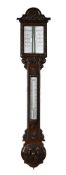 A VICTORIAN CARVED OAK MERCURY STICK BAROMETER