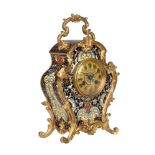 A FRENCH GILT BRASS AND CHAMPLEVE ENAMEL SMALL CARRIAGE MANTEL CLOCK