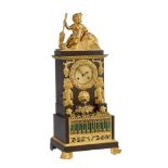 A FRENCH CHARLES X ORMOLU AND PATINATED BRONZE FUGURAL MANTEL CLOCK WITH WATER SPOUT AUTOMATON