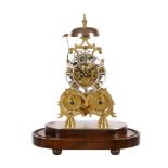 A VICTORIAN BRASS SKELETON CLOCK