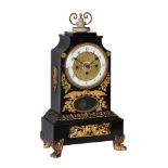 AN AUSTRIAN ORMOLU MOUNTED EBONISED GRANDE-SONNERIE STRIKING MANTEL CLOCK