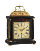 Y A GILT BRASS MOUNTED EBONY BASKET-TOP TABLE TIMEPIECE WITH SKELETONISED DIAL