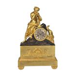 A FRENCH EMPIRE ORMOLU AND PATINTED BRONZE FIGURAL MANTEL CLOCK