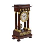 A FRENCH CHARLES X ORMOLU MOUNTED MAHOGANY MINIATURE PORTICO MANTEL TIMEPIECE