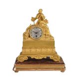 A RARE FRENCH CHARLES X MINIATURE ORMOLU FIGURAL MANTEL TIMEPIECE