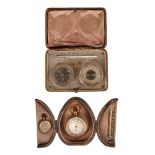 TWO CASED ANEROID BAROMETER, COMPASS AND THERMOMETER COMPENDIUMS