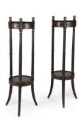 A PAIR OF REGENCY BLACK PAINTED AND GILT DECORATED STANDS OR ETAGERES, CIRCA 1820