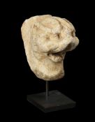 A FRAGMENTARY MARBLE MONOPODIA OF A PANTHER'S HEAD, ROMAN, 1ST-2ND CENTURY A.D.