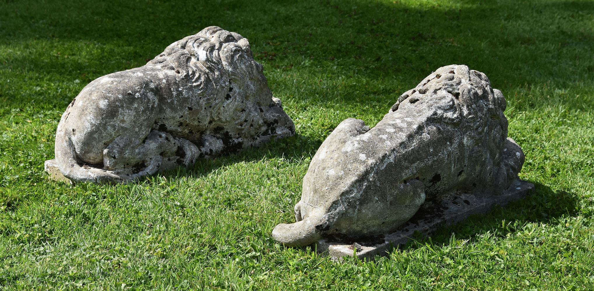 A PAIR OF COMPOSITION STONE MODELS OF RECUMBENT LIONS, 20TH CENTURY - Image 4 of 4