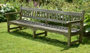 A LARGE HARDWOOD BENCH, 20TH CENTURY