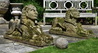 A PAIR OF STONE MODELS OF RECUMBENT SPHINXES, EARLY 20TH CENTURY