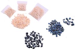 † A quantity of drilled cultured pearls and various unmounted sapphires