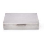 A silver rectangular cigarette box by William Comyns & Sons Ltd.