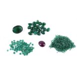 † A collection of various emerald and synthetic emerald stones