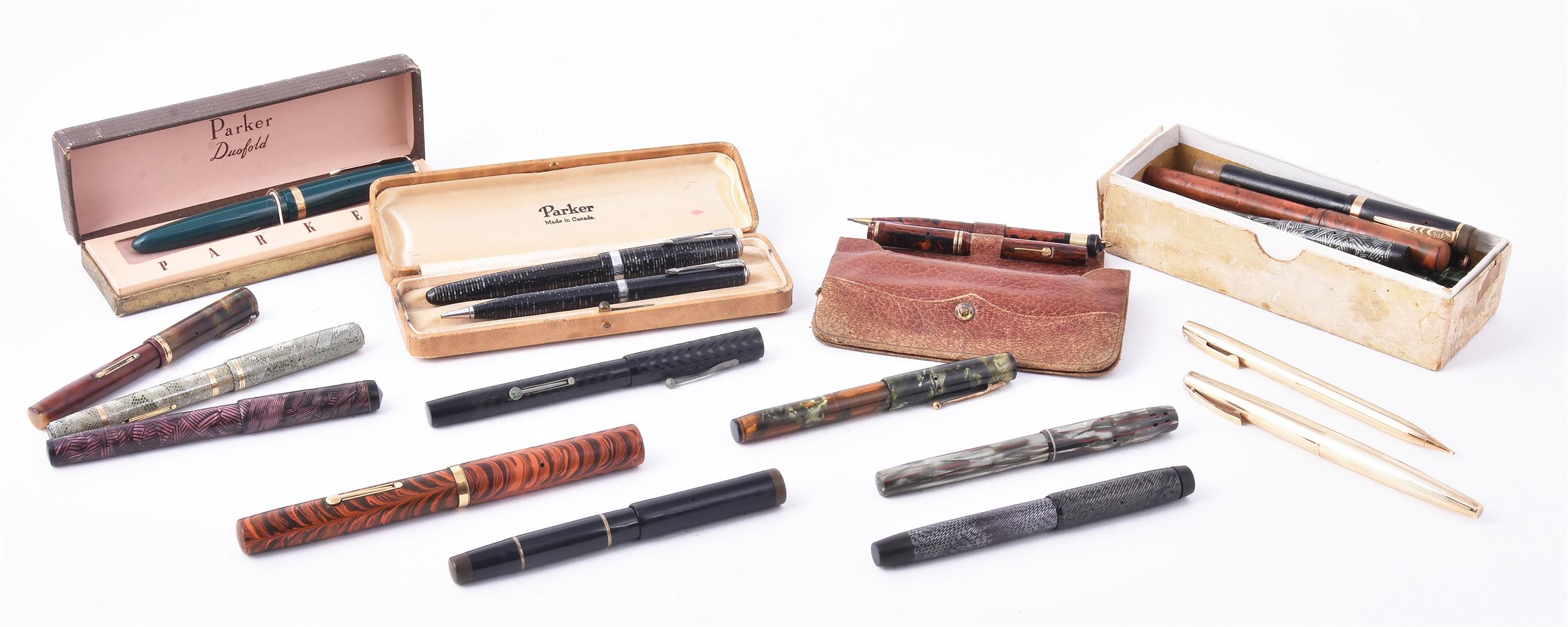 A collection of vintage marbled and other fountain pens