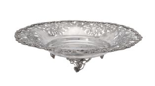 An Egyptian silver coloured shaped circular bowl