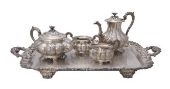 Y An electro-plated four piece tea set and twin handled tray by Birks