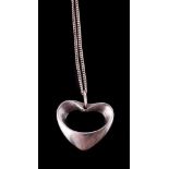 A silver heart shaped pendant by Henning Koppel for Georg Jensen