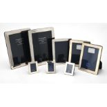 Five silver mounted rectangular photo frames by Kitney & Co.