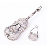 A William IV silver purse vinaigrette and a German silver model of a cello