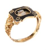 A gold and enamel William IV mourning ring