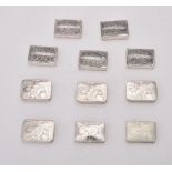 A collection of silver rectangular boxes
