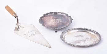 A silver shaped circular salver by C. J. Vander Ltd.