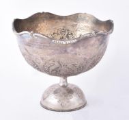 A Pakistani large silver coloured pedestal bowl