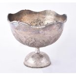 A Pakistani large silver coloured pedestal bowl