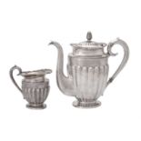 Y A Russian silver ovoid coffee pot and matching cream jug