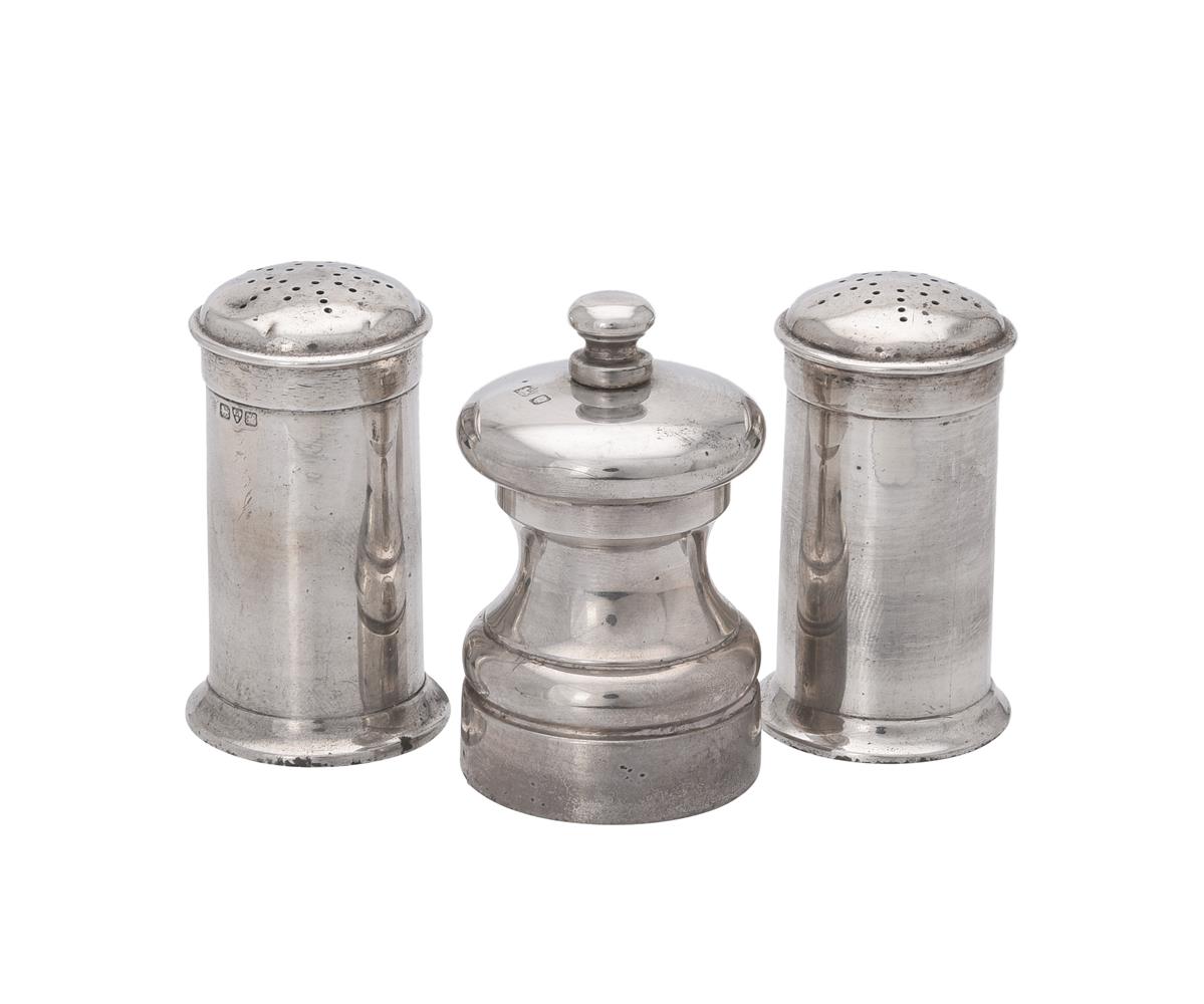 A pair of Edwardian silver cylindrical pepperettes by Haseler Brothers