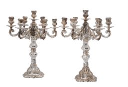 A pair of Italian silver coloured candelabra