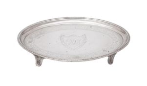 A George III silver shaped oval tea pot stand by Charles Aldridge
