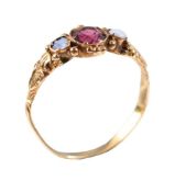 A Victorian garnet and opal three stone ring