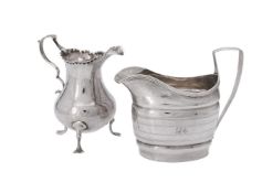 Two silver cream jugs