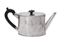A George III silver oval straight-sided tea pot by William Vincent