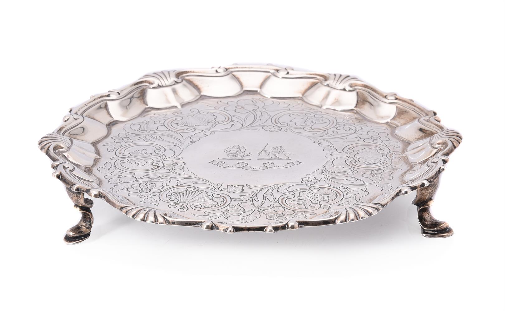 A George II silver shaped circular waiter