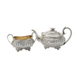 Y A late George III silver oblong baluster tea pot and sugar basin by William Barret II