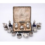 A silver five piece cruet set by Kemp Bros. of Bristol