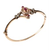 A ruby and diamond hinged bangle