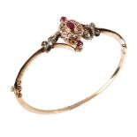 A ruby and diamond hinged bangle