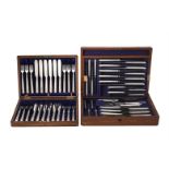 A cased set of twelve silver fish knives and forks by Harrods Stores Ltd.
