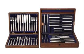 A cased set of twelve silver fish knives and forks by Harrods Stores Ltd.