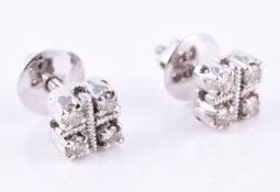 A pair of diamond ear studs