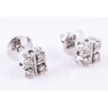 A pair of diamond ear studs